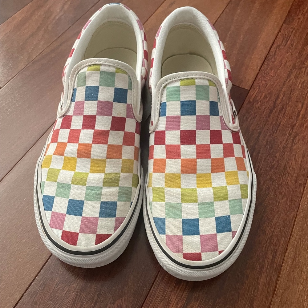 Rainbow checkered Vans slip ons